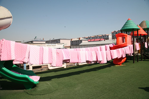 汪清三幼：暖心晒被褥 静待娃归来 .jpg